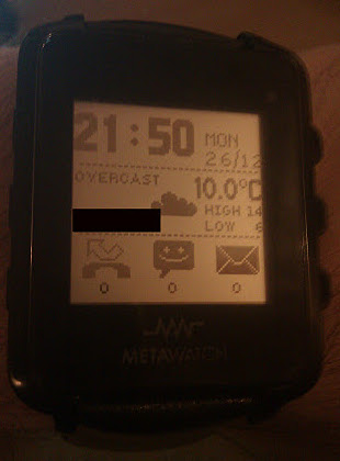 MetaWatch showing weather in more detail, and large indicators for missed calls/SMS/emails